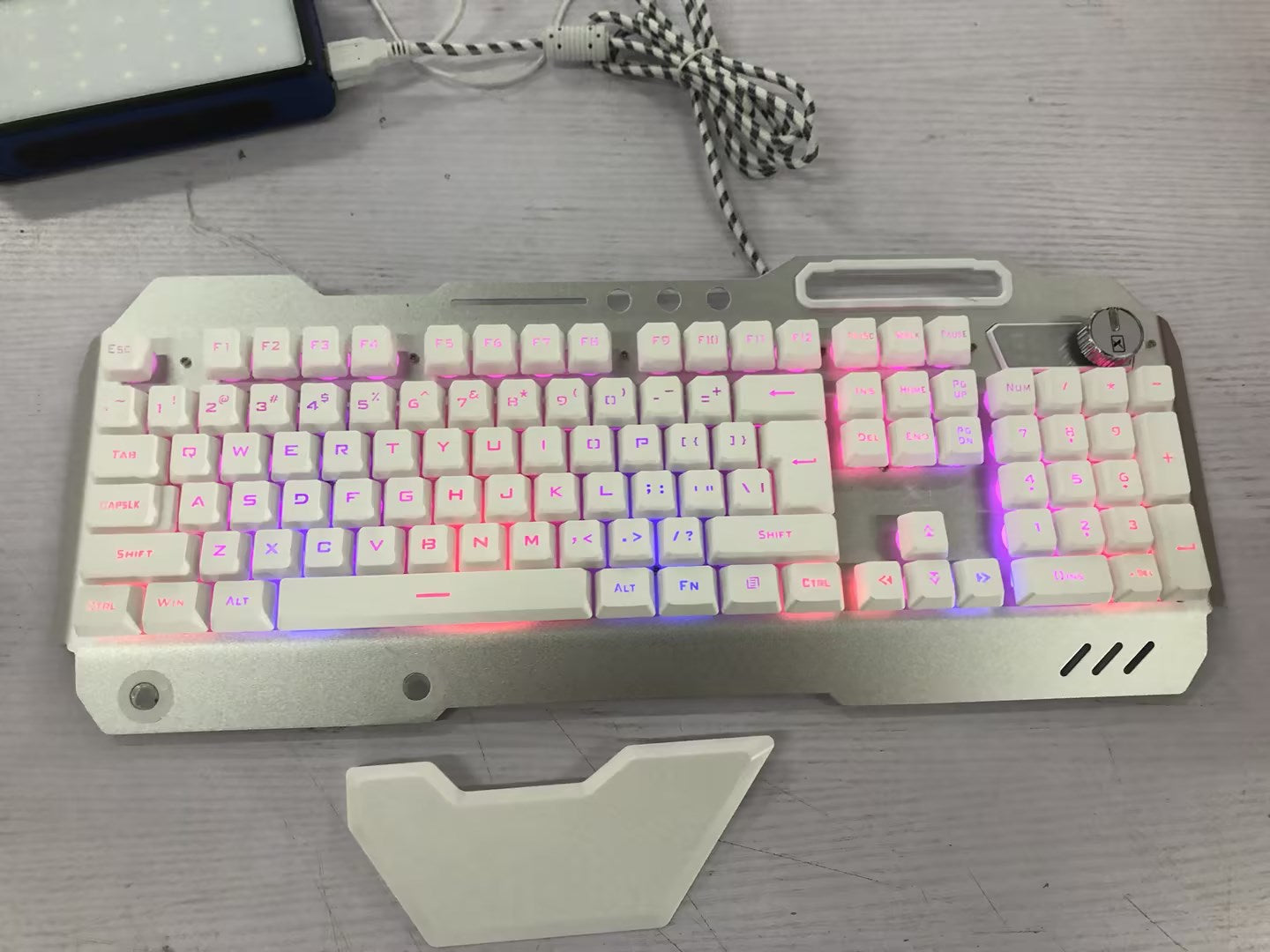 ergonomicwired-gaming-keyboard-with-rgb-backlight-phone-holder
